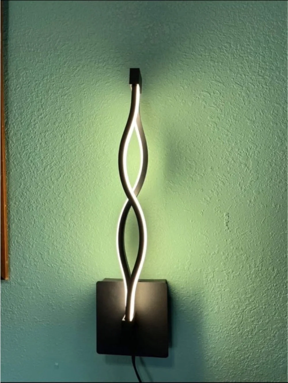Modern Black LED Wall Sconce - Twisted Ribbon Design